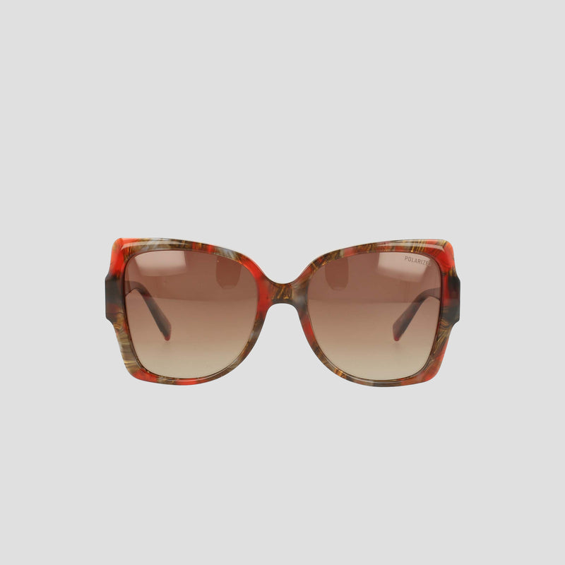 Champion Women's Polarized Oversized Butterfly sunglasses feature oversized, square frames in a red and brown tortoiseshell pattern with gradient brown polarized lenses. Crafted from handmade acetate for minimalist eyewear elegance, they are displayed against a plain light background.