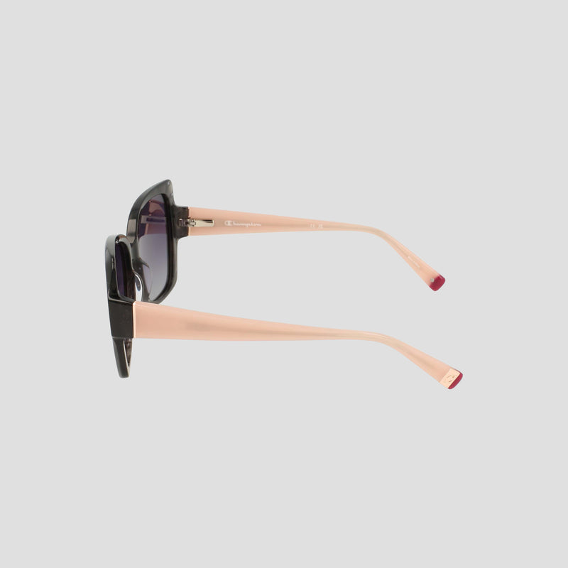 Side view of Champion Women's Polarized Oversized Butterfly sunglasses, handmade from black and pink acetate with dark polarized lenses, featuring pink arms and red tips. Set against a plain light gray background, this minimalist eyewear stands out in style.