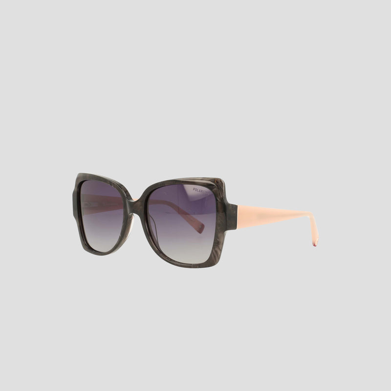 Champion Women's Polarized Oversized Butterfly sunglasses are square-shaped and handmade from acetate, featuring black gradient frames contrasted by thick light beige arms. Displayed against a plain light gray background, these minimalist eyewear pieces are equipped with tinted polarized lenses that transition from dark at the top to lighter at the bottom.