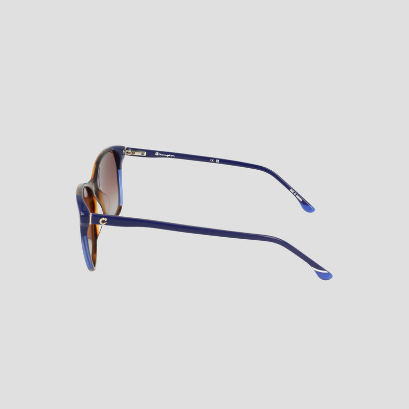 Side view of the Champion Women’s Polarized Catty Square sunglasses in blue, featuring brown gradient polarized lenses and thin arms, handcrafted from premium handmade acetate eyeglasses material, displayed on a plain light background.