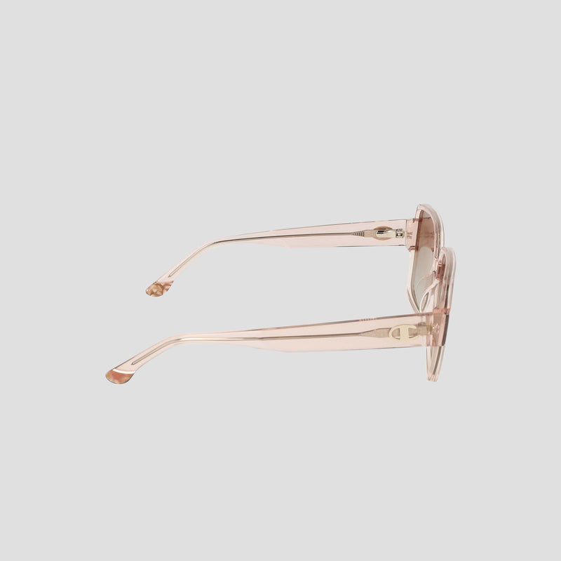 Side view of Champion Women's Polarized Glam Square eyeglasses in translucent pink with thick arms and an oversized square handmade acetate frame, displayed against a plain light gray background.