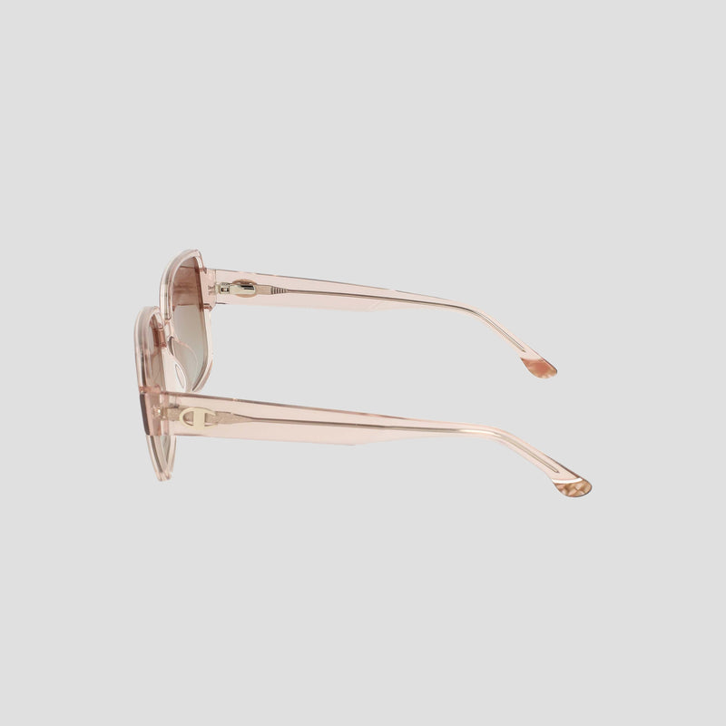 Side view of Champion Women's Polarized Glam Square sunglasses—translucent pale pink, oversized square handmade acetate frames with tapered arms—set against a plain light grey background.