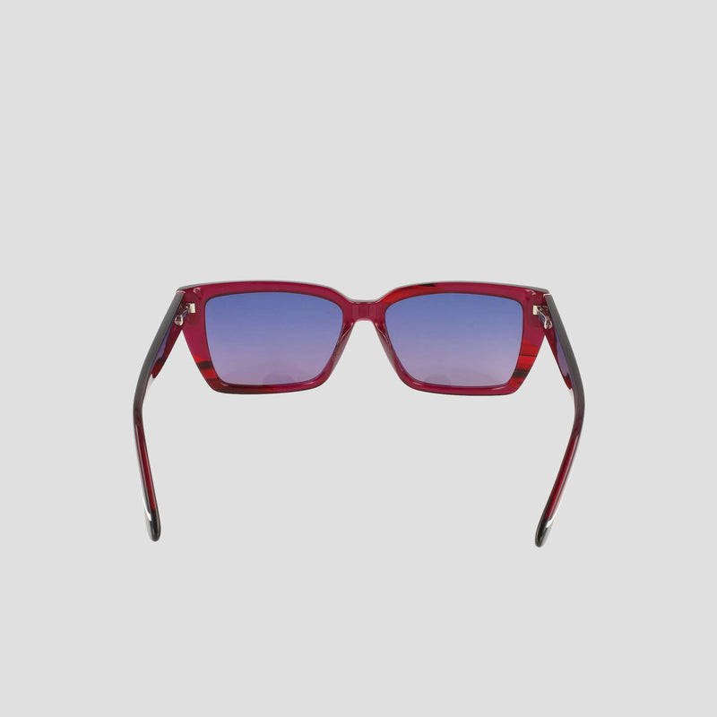 The Champion Women's Polarized Slim Rectangle sunglasses feature a red handmade acetate frame and gradient blue-purple lenses, shown from the front against a plain light background.