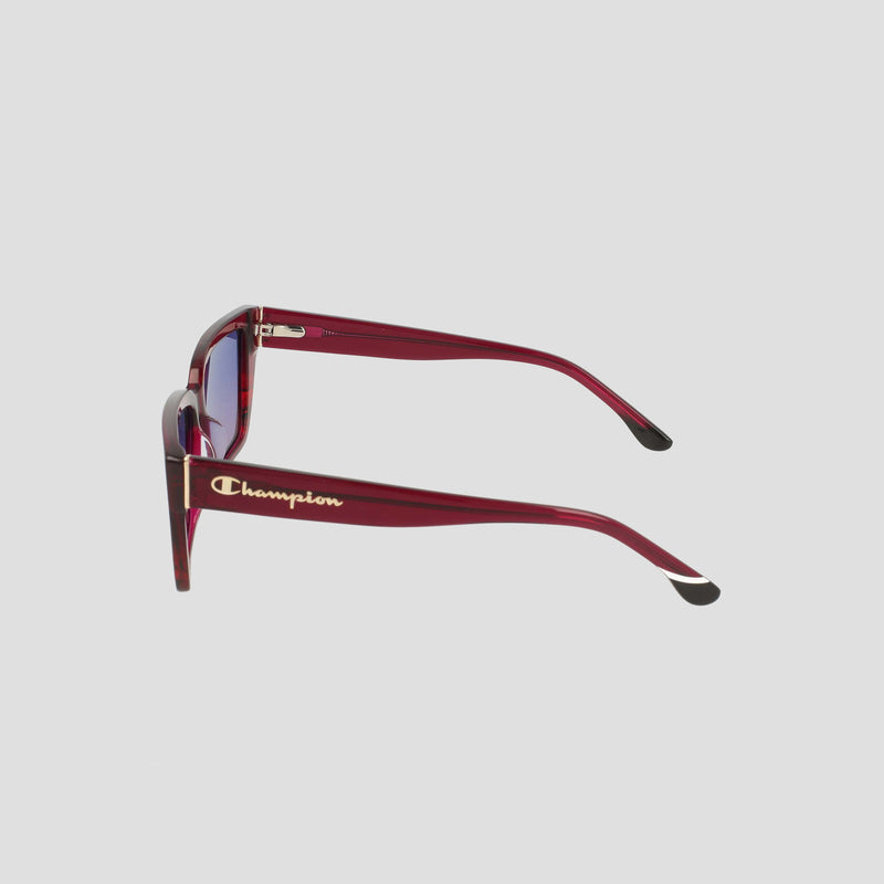 Side view of Women's Polarized Slim Rectangle glasses by Champion in red handmade acetate, thick frames, black-tipped arms, and gold Champion logo, set against a plain light gray background.