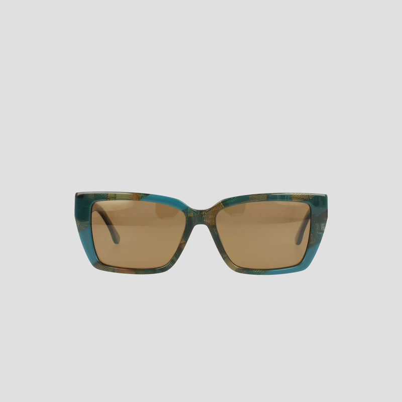 The Champion Women's Polarized Slim Rectangle sunglasses feature a handmade acetate tortoiseshell-style green and teal frame with brown-tinted lenses, displayed on a plain white background.