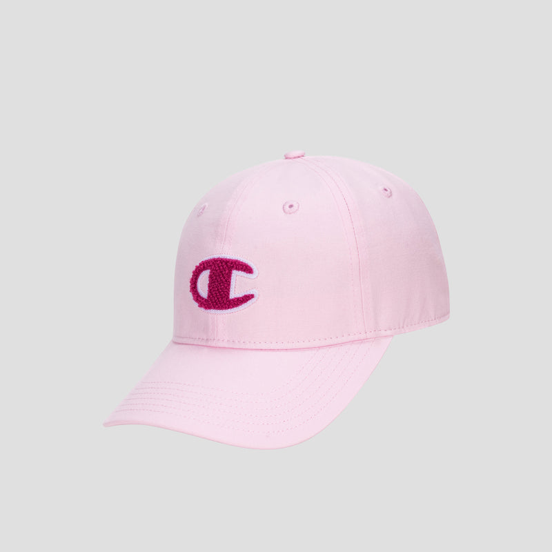 The Champion Amber Chenille Adjustable Baseball Cap is crafted from light pink slub canvas with a curved brim, and showcases a dark pink chenille patch C logo embroidered on the front. Its unconstructed fit enhances its relaxed style, presented here against a plain light gray background.