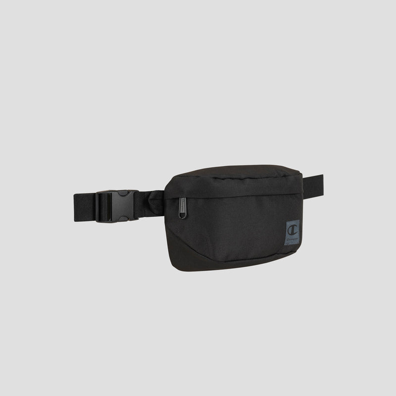 The Atlas Waist Pack by Champion, shown in black against a plain light gray background, features a front zipper pocket and an adjustable buckle strap, providing adventure-ready storage for all your essentials.