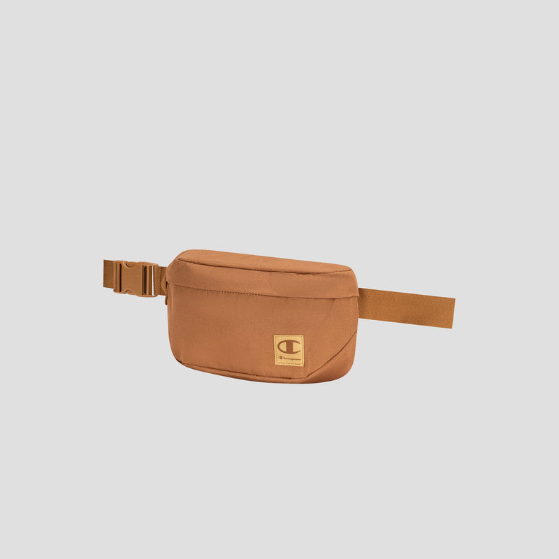 The Atlas Waist Pack by Champion, featuring a brown rectangular design with an adjustable strap, buckle closure, and a small front logo patch, offers hands-free convenience against a plain light background.