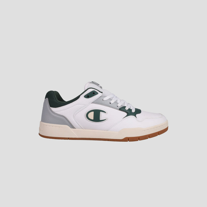 The Champion Men's Arena Lo V2 is a white and green low-top court sneaker with heritage styling, a gum sole, lace-up design, and the Champion logo on the side, shown against a plain light gray background.