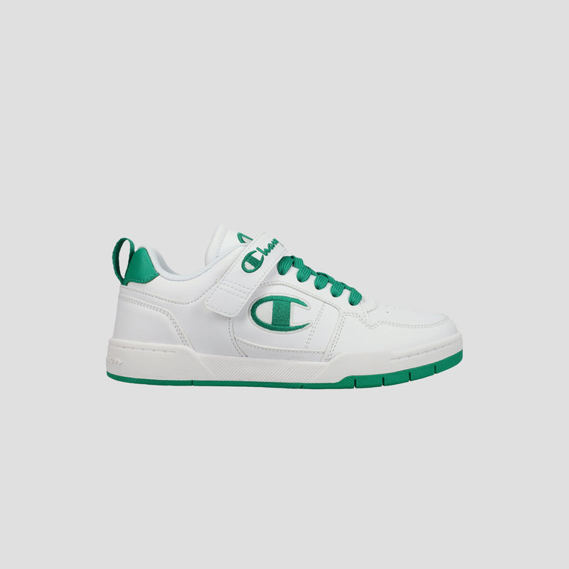 The Champion Kids' Arena Power Low sneaker features a white design with green accents, green laces, a green side logo, plus a green sole and heel tab. Shown on a light gray background, it delivers classic Champion style for kids.