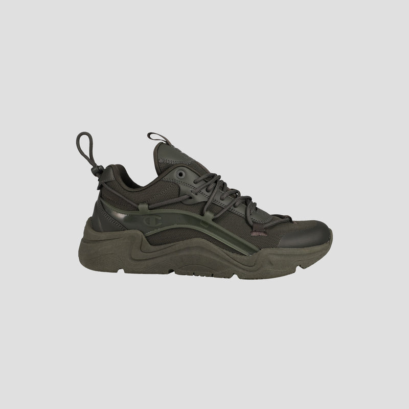 The Champion Men's Hyper C Pilot is a dark green and black lifestyle sneaker with a chunky sole, durable mesh upper, synthetic overlays, lace-up front, and pull tabs, shown side profile on a light gray background.