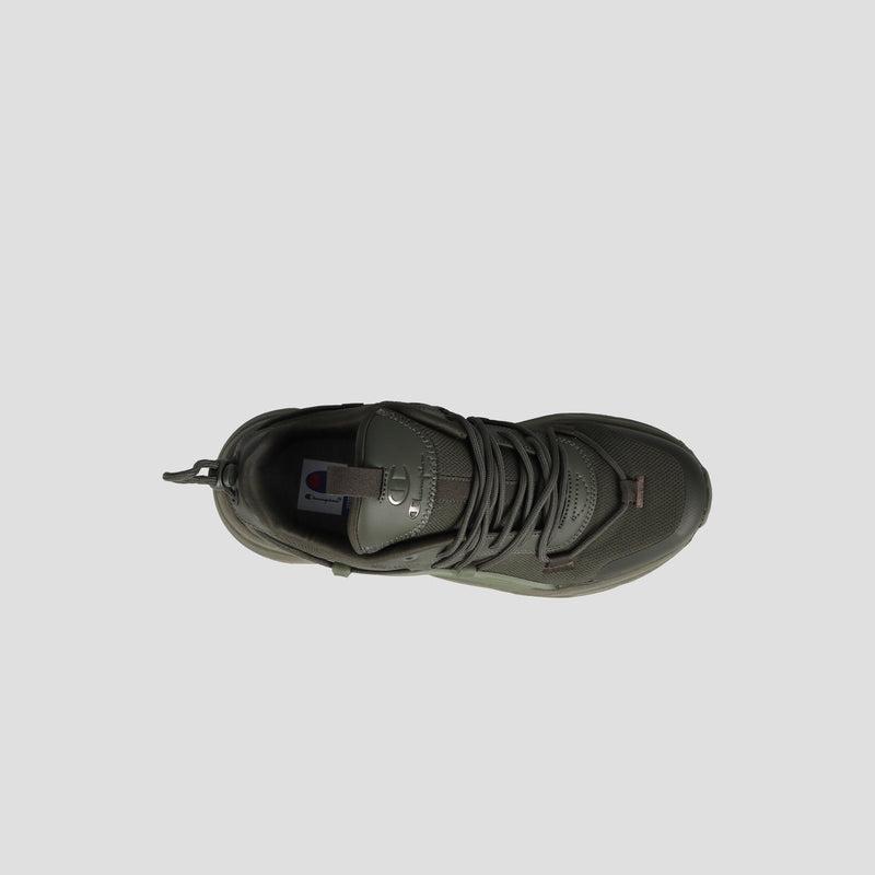 Top view of the Champion Men's Hyper C Pilot sneaker in dark green, featuring a durable mesh upper, black laces, heel pull tab, and the Champion logo on the tongue, shown against a light gray background.