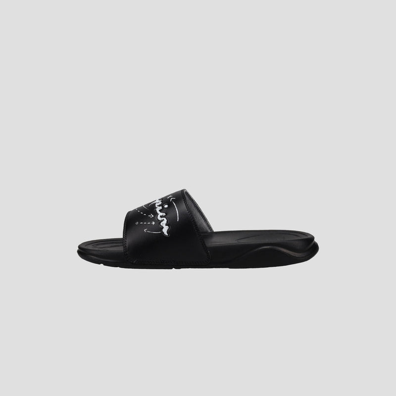 The Champion Kids' Mega SFB Slide is a black sandal with a thick strap and white cursive branding, designed for lightweight comfort and shown on a plain gray background.