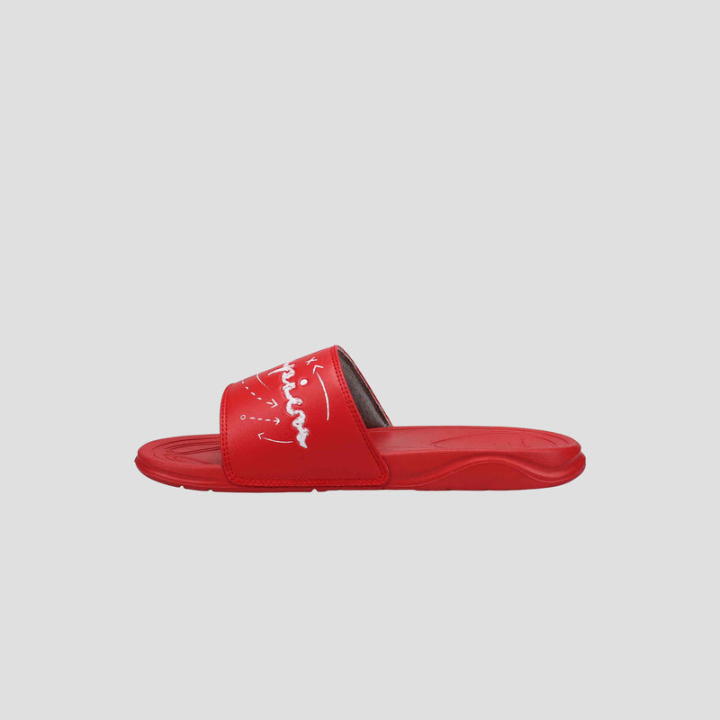 The Champion Men's Mega SFB Slide is a red sandal with a single wide strap featuring white cursive branding. Both the sole and strap are red, and the contoured footbed offers comfort. Shown against a light grey background.
