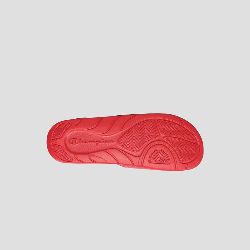 The Men's Mega SFB Slide by Champion features a red rubber sole with wavy and zigzag tread patterns and an embossed Champion logo at the center. Ideal for slide sandals for men. Set against a plain light gray background.