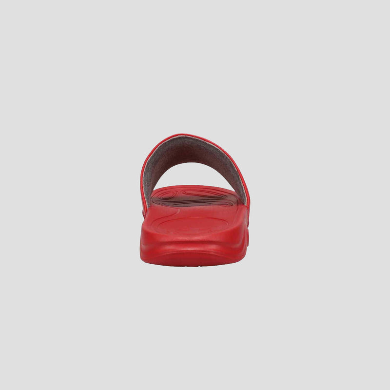 The Champion Men's Mega SFB Slide is a red sandal with an open toe, curved strap, and textured contoured footbed for comfort. Its simple, casual design makes it perfect for everyday wear.