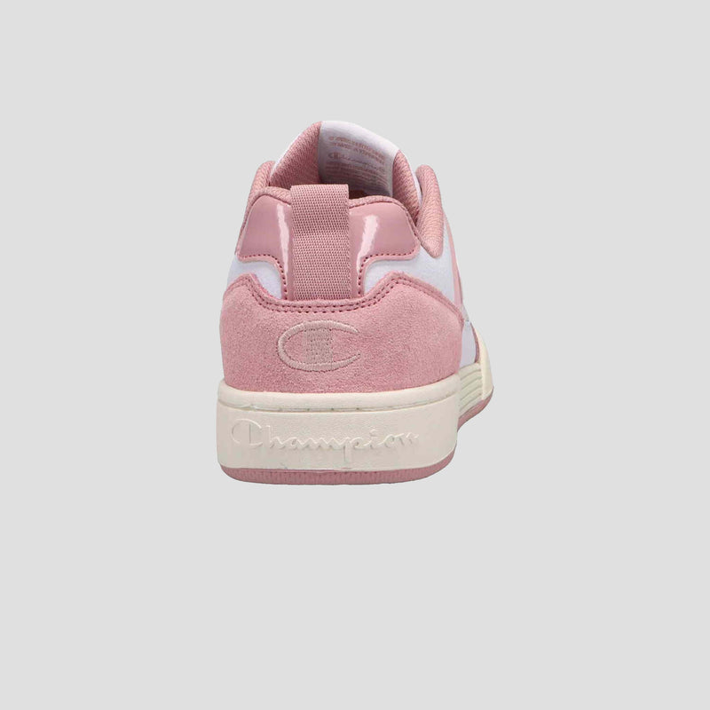 The Champion Women's 5-on-5 Low sneakers in pink and white are shown from the back, highlighting a cushioned collar, suede heel, pull tab, embroidered C logo, and branded off-white rubber sole against a light gray background.