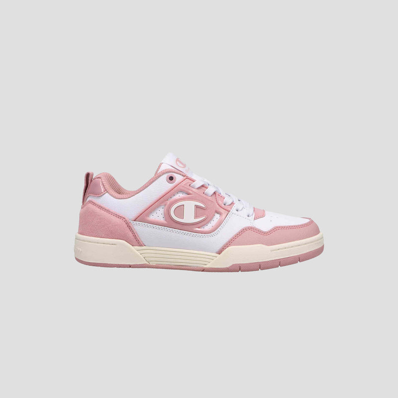 The Champion Women's 5-on-5 Low is a pink and white low-top sneaker with a chunky sole, cushioned collar, white laces, and a bold “C” logo on the side, shown against a plain light gray background.