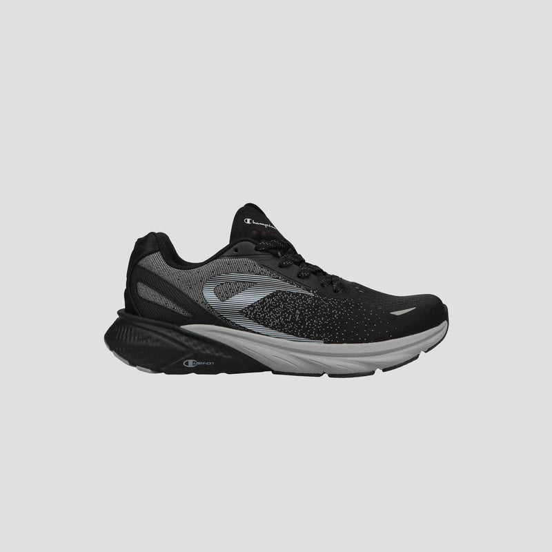 The Champion Men's Alpha running shoe in black and gray features mesh panels, a lace-up closure, and a thick cushioned sole—ideal for gym workouts—and is shown in a side profile view against a plain gray background.