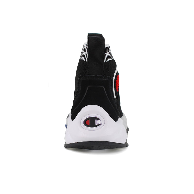 Back view of a black Champion Men's Rally Pro sneaker with a white sole, black pull tab, and Champion logo on the heel. This stylish slip-on features a red accent on the side and white detailing around the ankle, offering both comfort and athletic appeal.