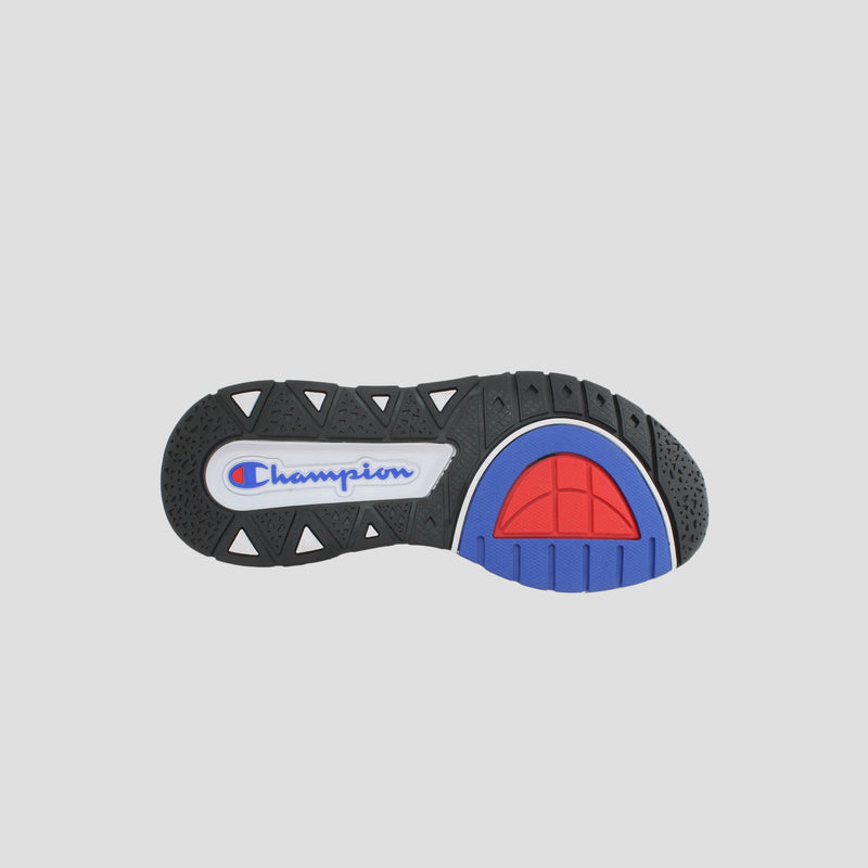 The image displays the sole of the Champion Kids' Rally Pro black high-top sneaker, featuring blue and red Champion logos with coordinating accents along the right side, set against a white background.