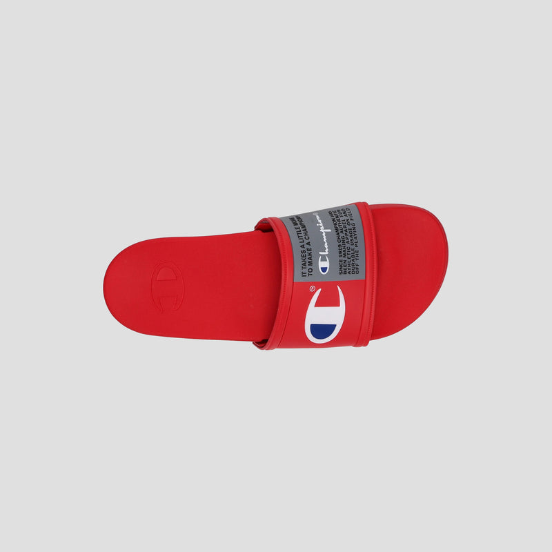 A single red Champion Men's IPO Squish Slide with a contoured footbed and blue, white, and red Champion logo on the strap, plus black printed text. Lightweight slide shown from above on a plain light gray background.