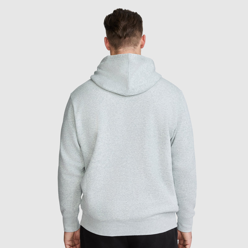 A man seen from behind wearing a light gray Champion Powerblend Hoodie, Full Script Logo - Big & Tall.
