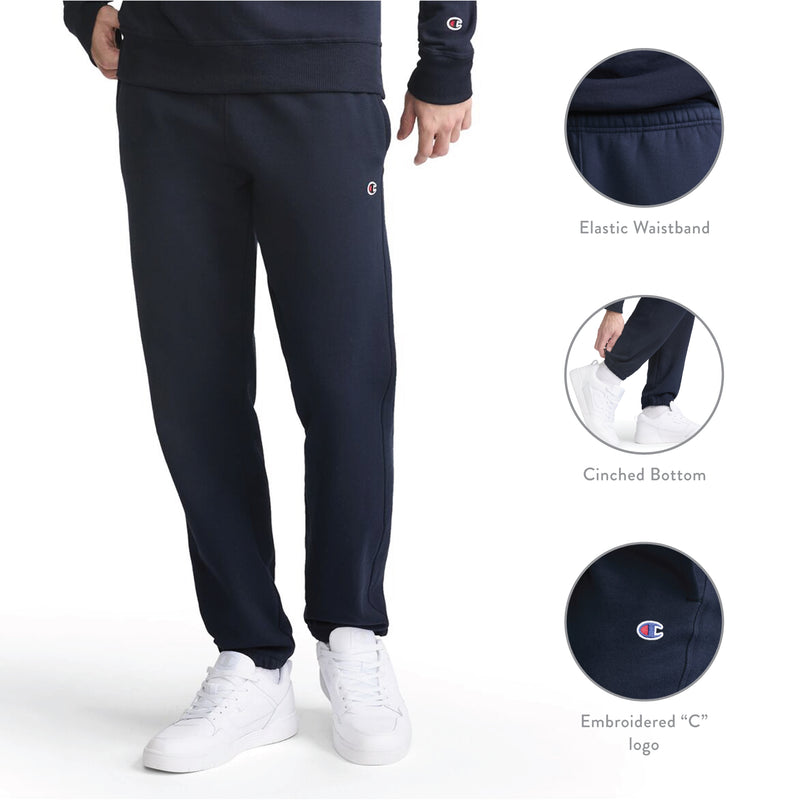A person is shown wearing Champion Powerblend Sweatpants, Cinched Bottom, C Logo - Big & Tall, paired with white sneakers; close-up images highlight the elastic waistband, cinched bottom cuffs, and signature embroidered C logo detailing.