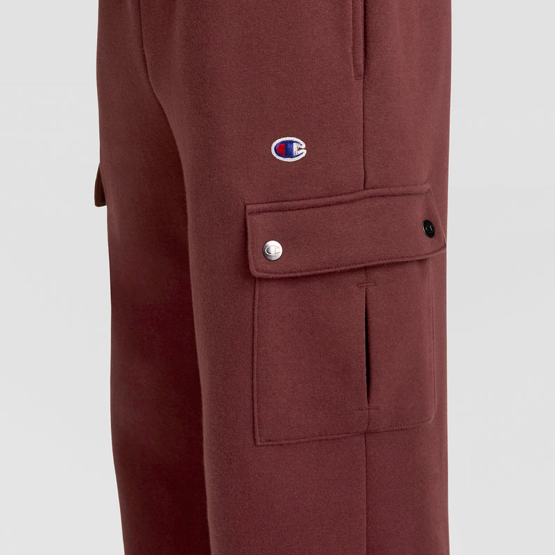 Side view of the Champion Fleece Cargo Pant, C Logo in maroon, featuring classic cargo pant styling with a buttoned flap pocket and a small C logo patch above the pocket—ideal for streetwear enthusiasts.