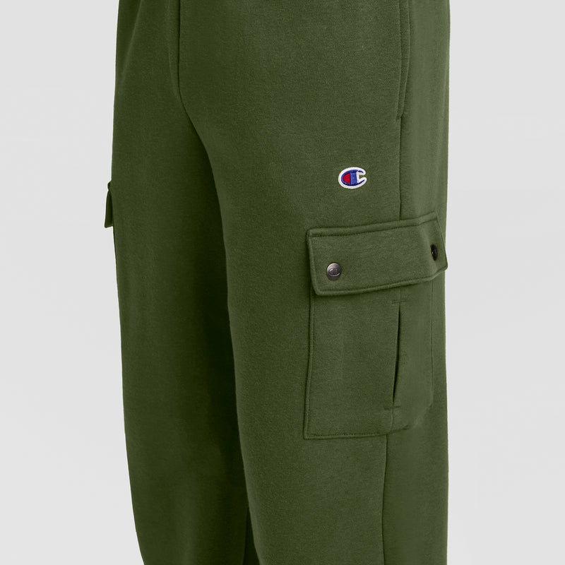 Close-up of Champion Fleece Cargo Pant, C Logo in green streetwear style, featuring a small C logo on the thigh and a buttoned side pocket—blending classic Champion design with modern comfort and style.