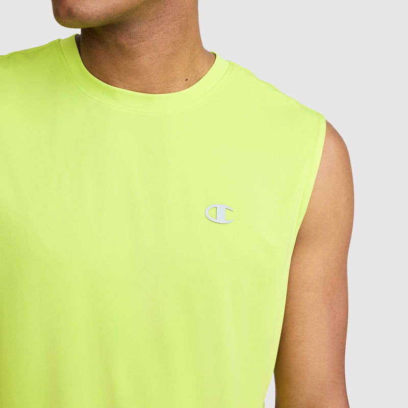 A person wearing a Champion Sport Muscle Tank, Reflective C Logo, in sleeveless neon yellow with a small reflective Champion "C" logo on the chest, photographed from the shoulders up against a plain light background. This moisture-wicking muscle tank keeps you cool and comfortable during any activity.