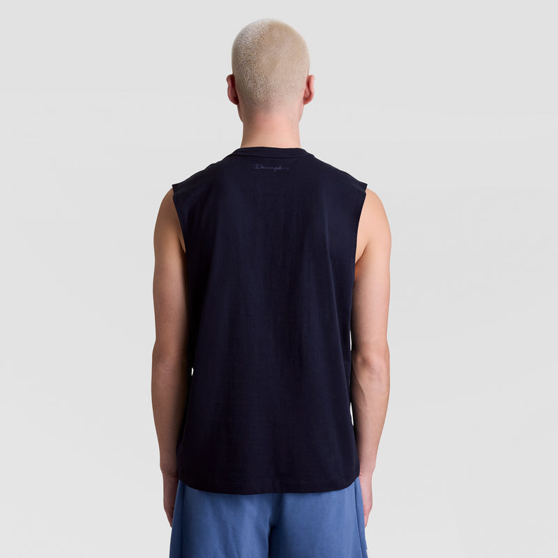 A person with short blond hair is shown from behind, wearing a black Champion Muscle Tank (C Logo) and blue shorts, standing against a plain light gray background.