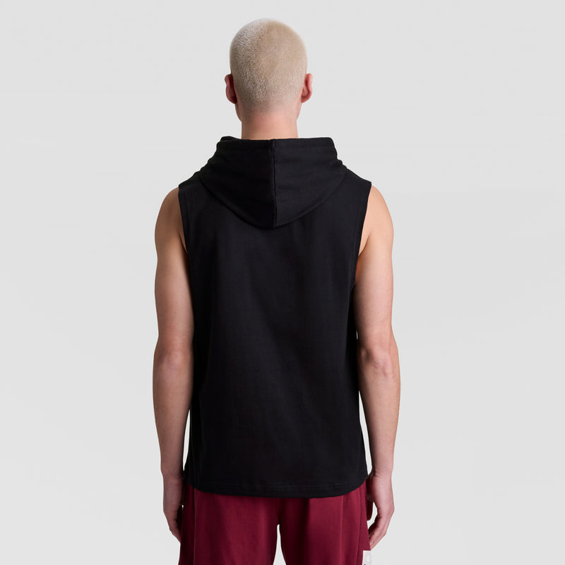 A person with short, light blond hair is seen from the back, wearing a Champion Sleeveless Hoodie, C Logo and maroon shorts, standing against a plain light gray background.