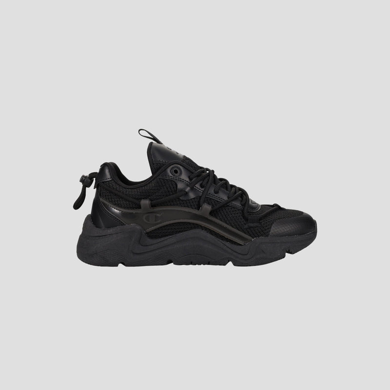 The Champion Men's Hyper C Pilot W is a black lifestyle sneaker with a chunky sole, mesh upper, synthetic overlays, lace-up front, and pull tab at the heel, shown in side profile against a plain light gray background.