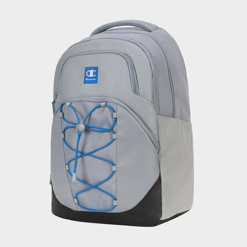 The Champion Summit Backpack features a light gray design with a front zip pocket, blue bungee cord detail, side mesh pockets, top handle, visible logo on the upper pocket, and a padded laptop sleeve for protection.