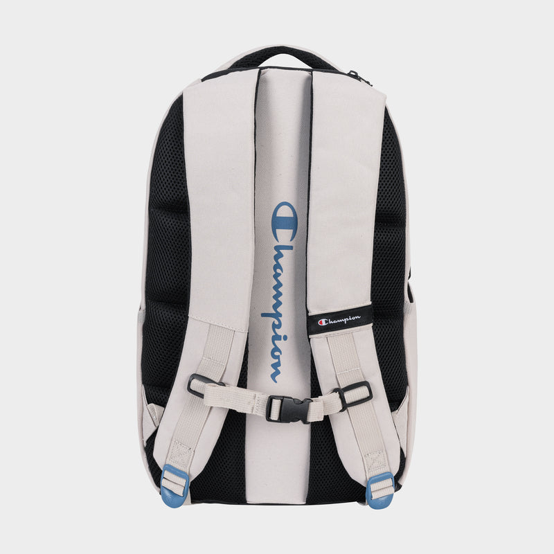 The Summit Backpack by Champion, seen from the back, comes in beige and black with padded shoulder straps, weather resistance, black mesh padding, blue plastic strap adjusters, and blue Champion branding.