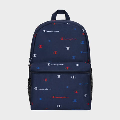 The Champion Kids' Merit Backpack in navy blue features a front zipper pocket, mesh side pockets, and a repeating white, red, and blue Champion logo pattern—combining durability with style for youth.