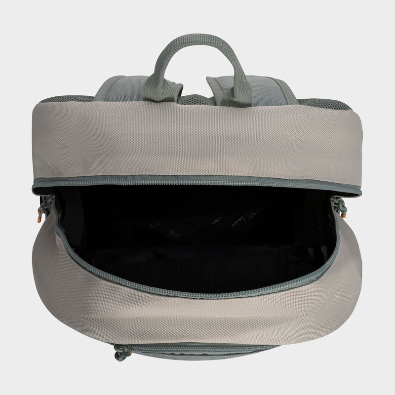 The Champion Kid's Bungee Backpack is shown in light gray with its main compartment open, revealing the interior. This durable kids' backpack features two top handles and padded shoulder straps on the back.