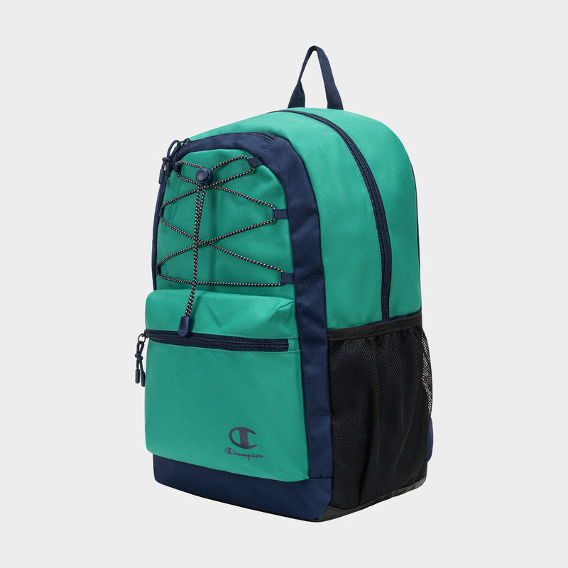 The Champion Kid's Bungee Backpack in green and navy features a front zip pocket, side mesh pocket, top handle, and bungee cord detail—ideal for kids’ sports. Shown on a plain white background.