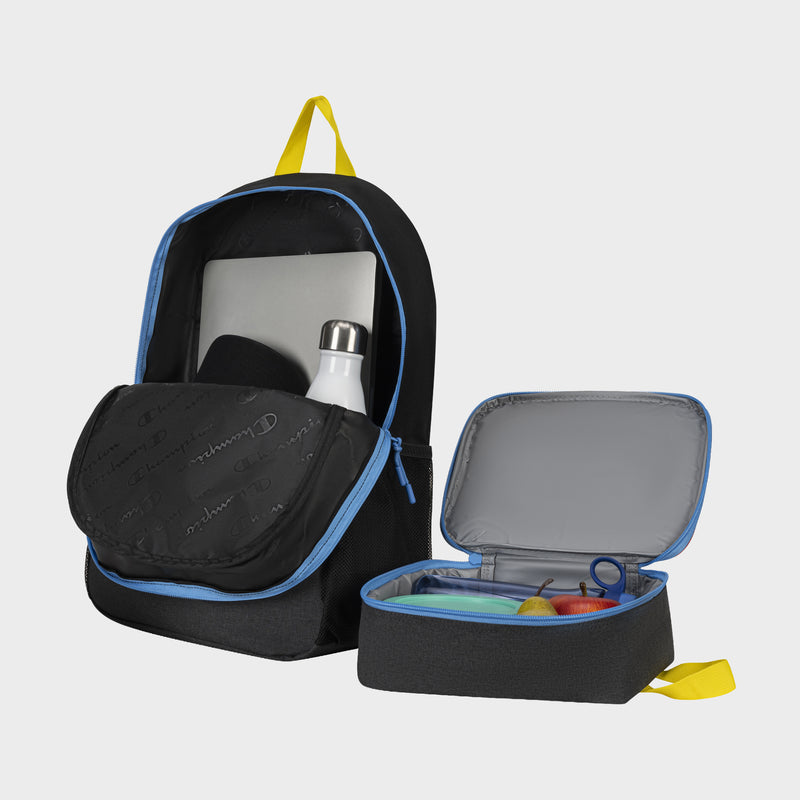 The Champion Kids' Mode Lunch Kit & Backpack Combo is shown open in black with a yellow handle, displaying a water bottle, laptop, and mouse. Beside it rests the insulated lunch kit with an apple, sandwich, and blue fork inside.