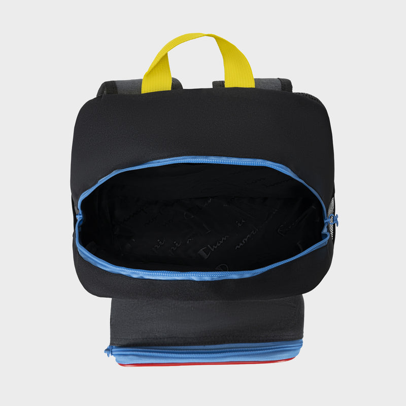 The Champion Kids' Mode Lunch Kit & Backpack Combo in black features a yellow handle, blue zippers, a spacious main compartment, and a separate lower section ideal for an insulated lunch box. The product is displayed against a plain white background.