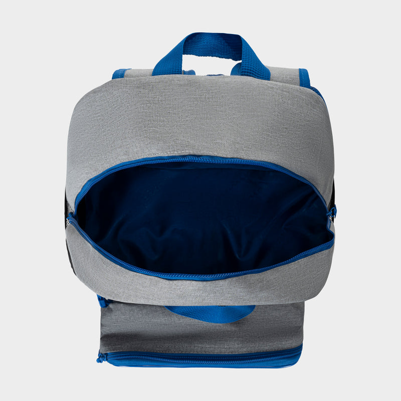 The Champion Kids' Mode Lunch Kit & Backpack Combo features a gray and blue insulated lunch box with blue handles, zippers, and a top compartment that opens to reveal a spacious dark blue interior—ideal for active kids.