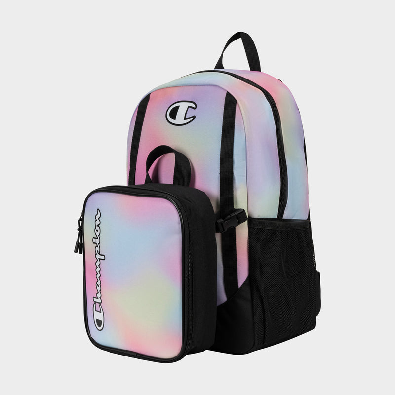 The Champion Kids' Mode Lunch Kit & Backpack Combo features a pastel gradient polyester backpack with black trim and a matching insulated lunch box. Both have the Champion logo, zip closures, and mesh side pockets, shown on a plain light background.