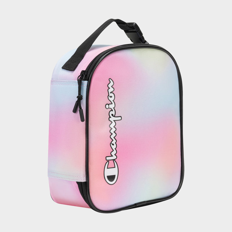 The Champion Kids' Merit Lunch Box features a pastel tie-dye design in pink, blue, yellow, and purple with a black zipper and handle. It’s insulated to keep food fresh and has "Champion" printed vertically in white with a black outline.