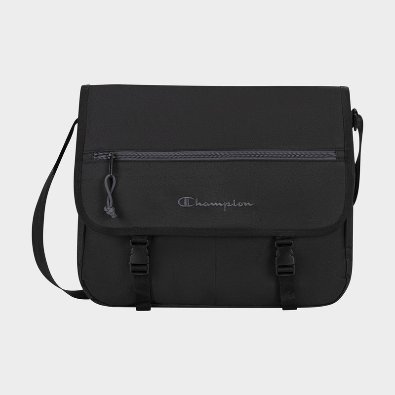 The Champion Phase Messenger Bag is black with an adjustable shoulder strap, front flap zip pocket, embroidered logo, padded laptop sleeve, and two bottom buckle closures.