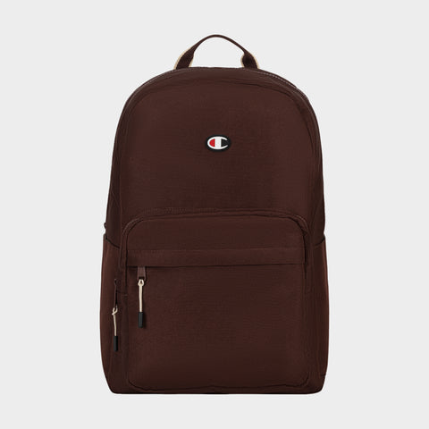 The Champion Level Backpack in brown features two zippered compartments, a top handle, and the signature Champion logo on the front. Perfect for everyday use, it includes a padded laptop sleeve and is displayed against a plain white background.