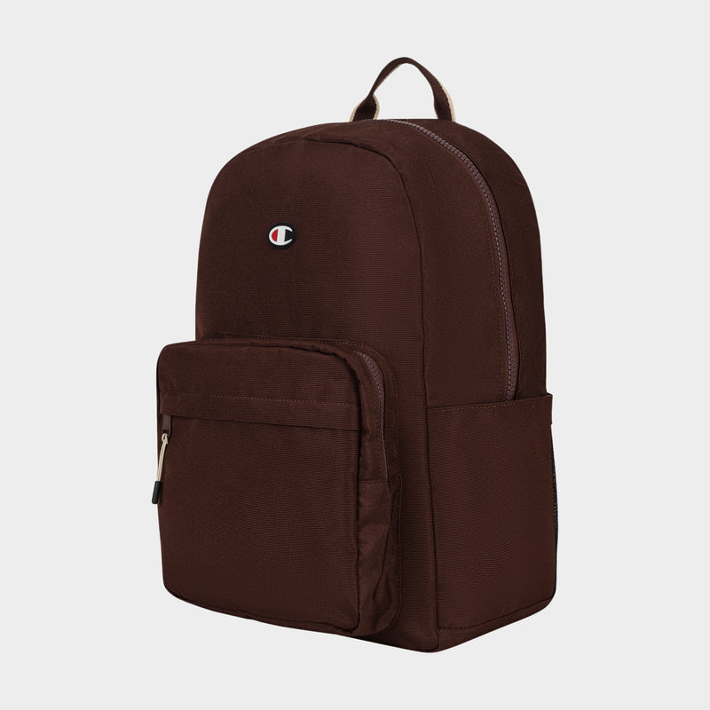 Introducing the Champion Level Backpack—a simple, minimalist brown backpack featuring a front zip pocket, a small side pocket, and a convenient top handle. The iconic Champion logo is stitched near the top center, and inside you’ll find a padded laptop sleeve—making it perfect for your everyday carry needs.
