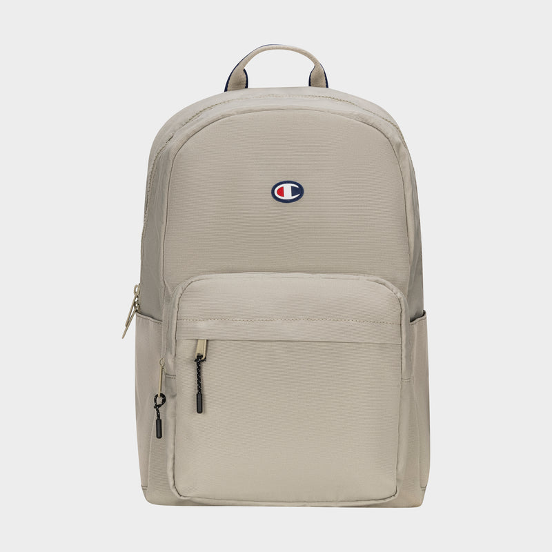 The Champion Level Backpack in beige features a front zipper pocket, small logo patch near the top, and padded laptop sleeve—ideal for daily use. Shown on a plain white background.