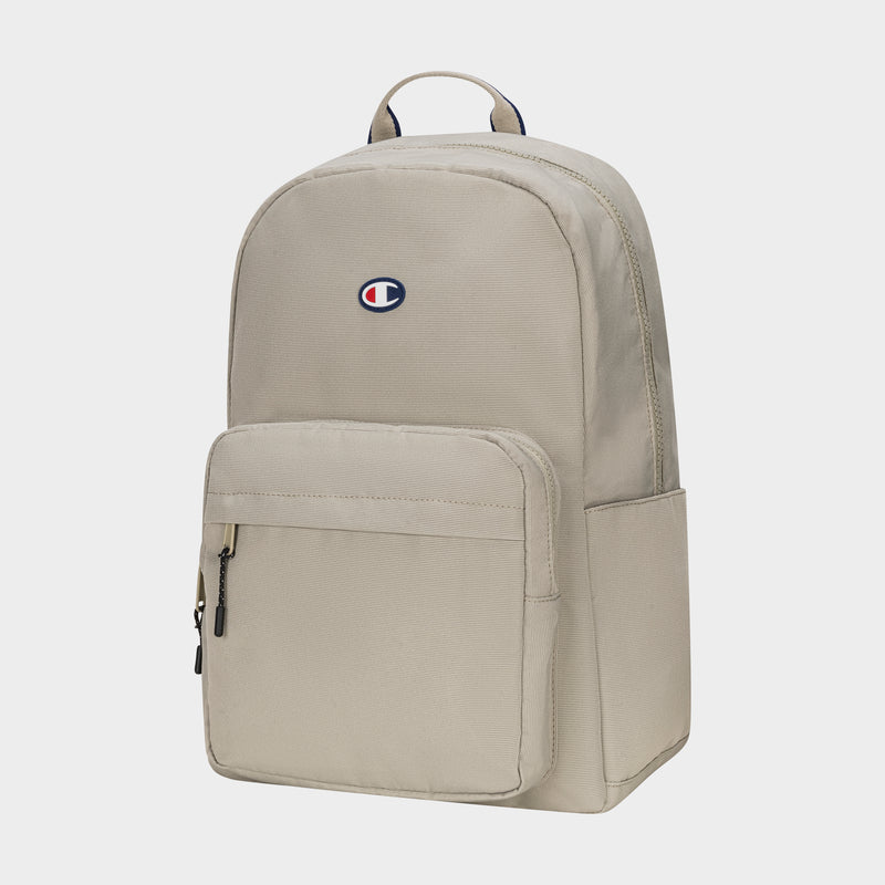 The Champion Level Backpack in beige features a front zipper pocket, padded laptop sleeve, and a small top-center logo—ideal for daily use and displayed on a plain white background.