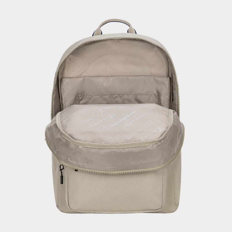 The Champion Level Backpack in beige features a roomy main compartment, padded laptop sleeve, multiple pockets, and a patterned inner lining with the Champion logo—ideal for everyday use.